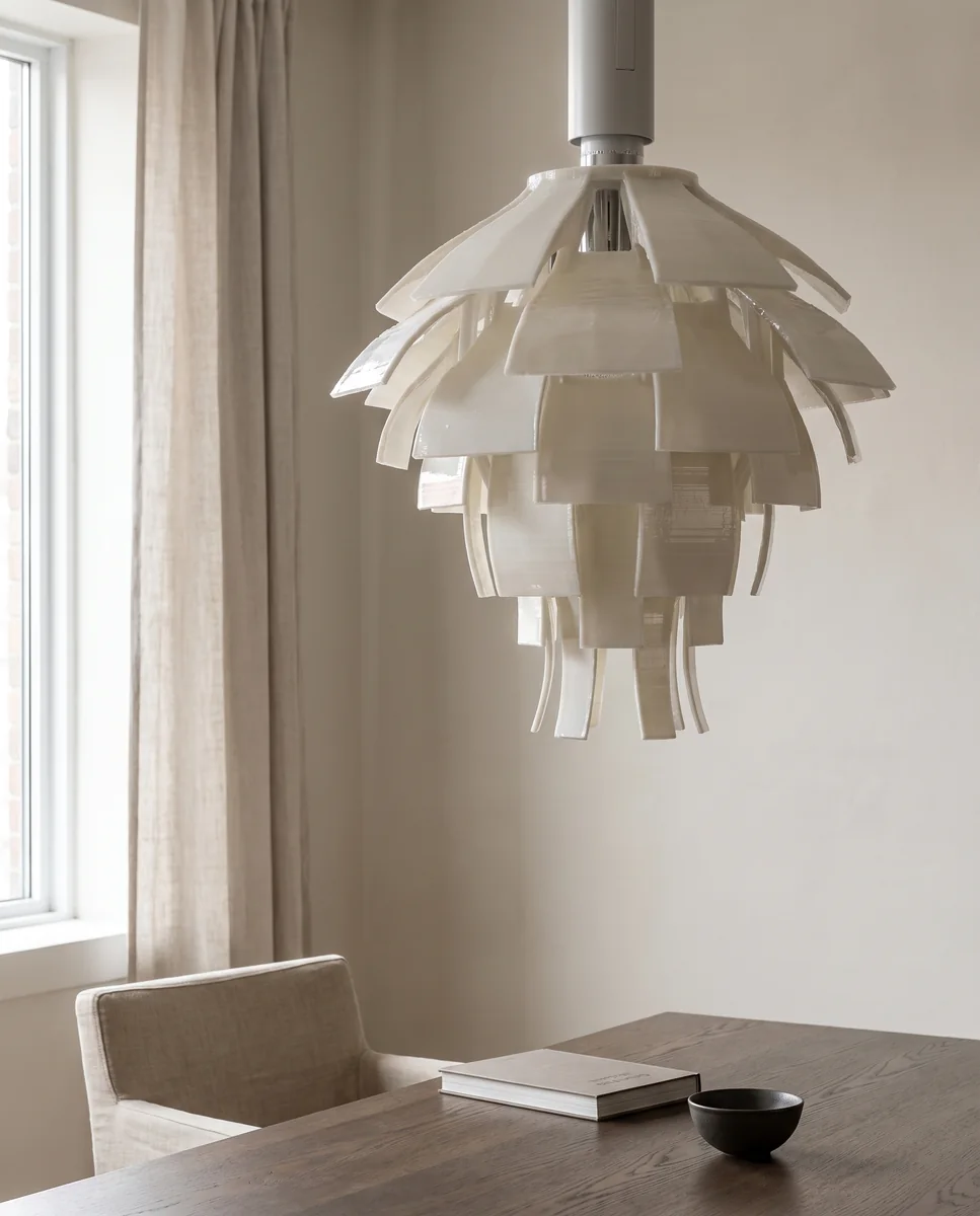 Layered ivory pendant above a dining table